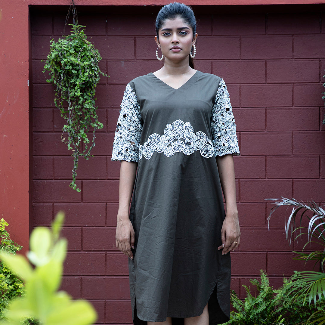 Cutwork dress with stylish belt
