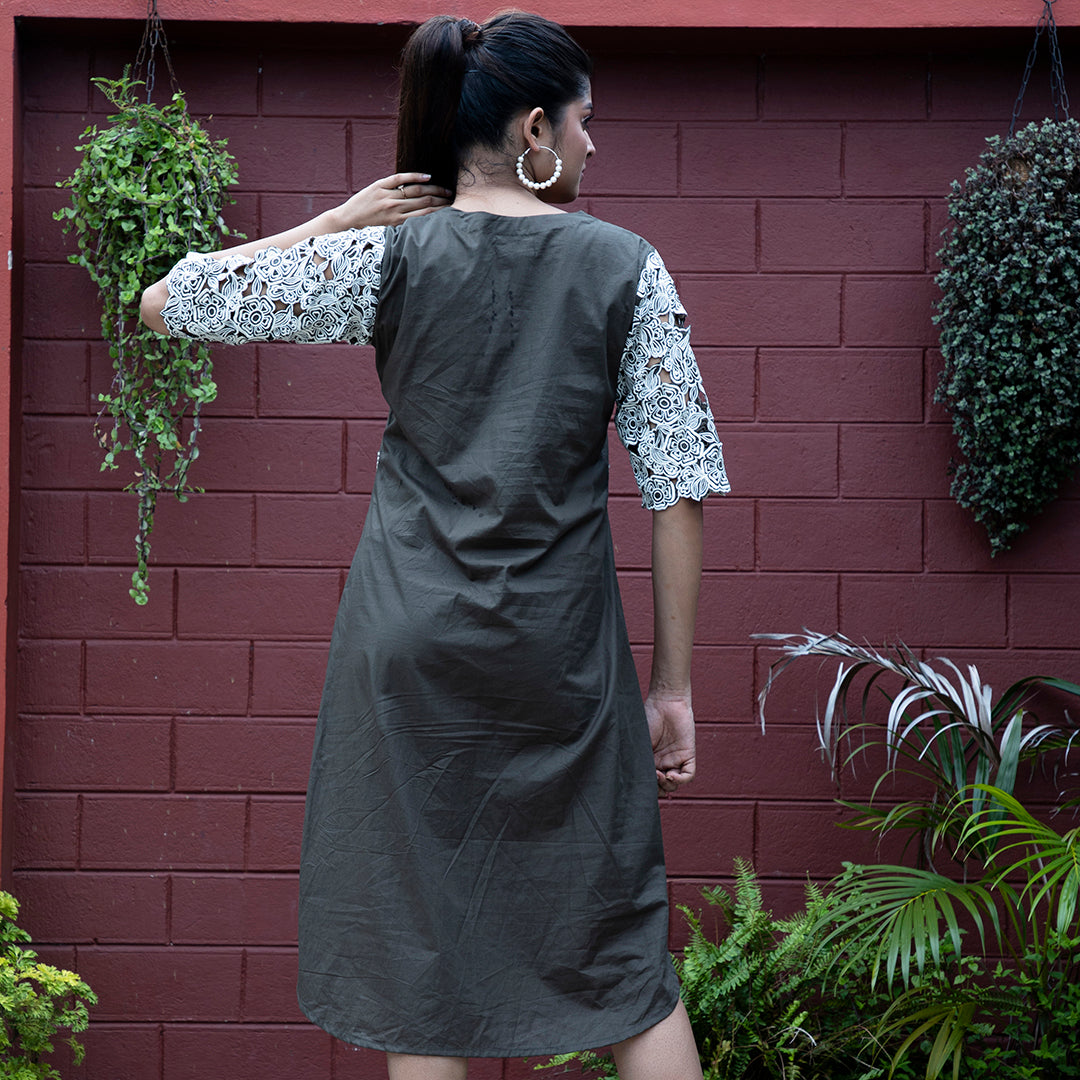 Cutwork dress with stylish belt