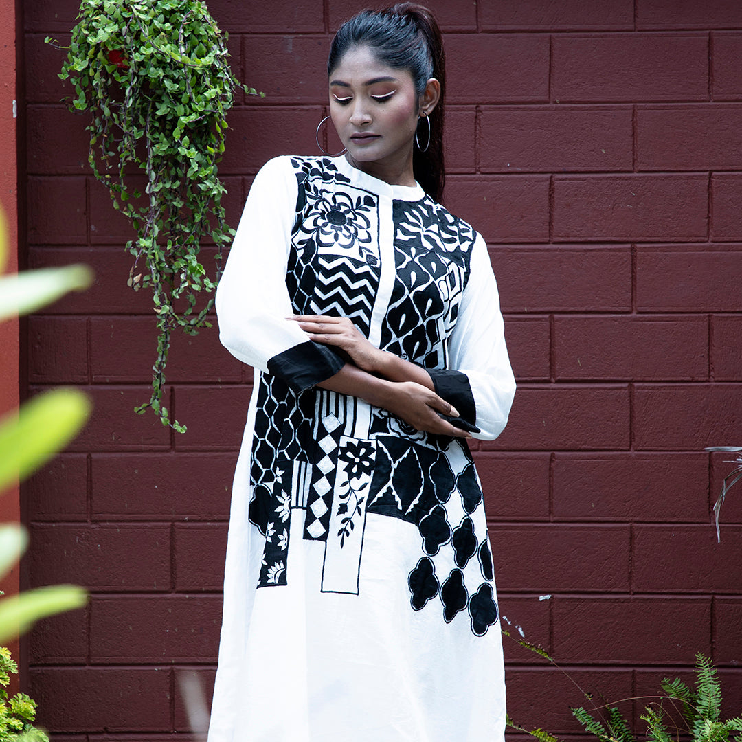 White and black applique dress