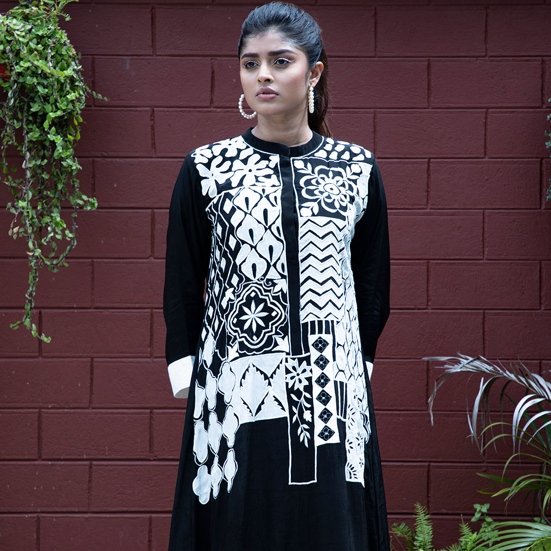 Black and white applique dress