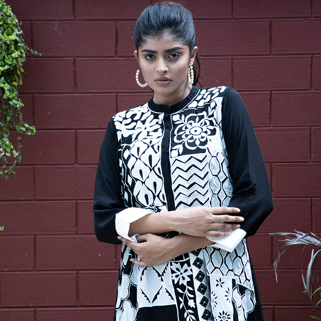 Black and white applique dress