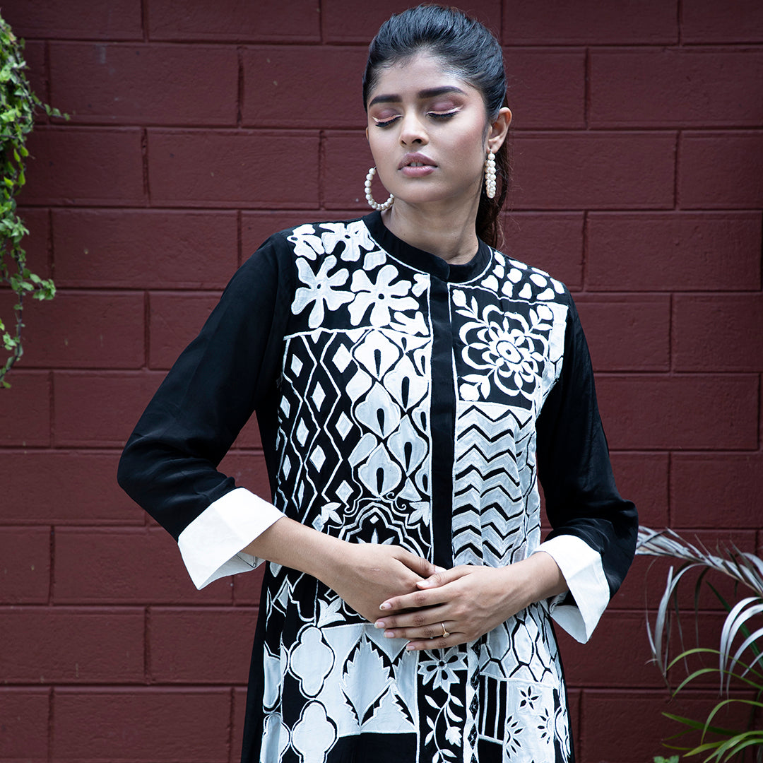 Black and white applique dress