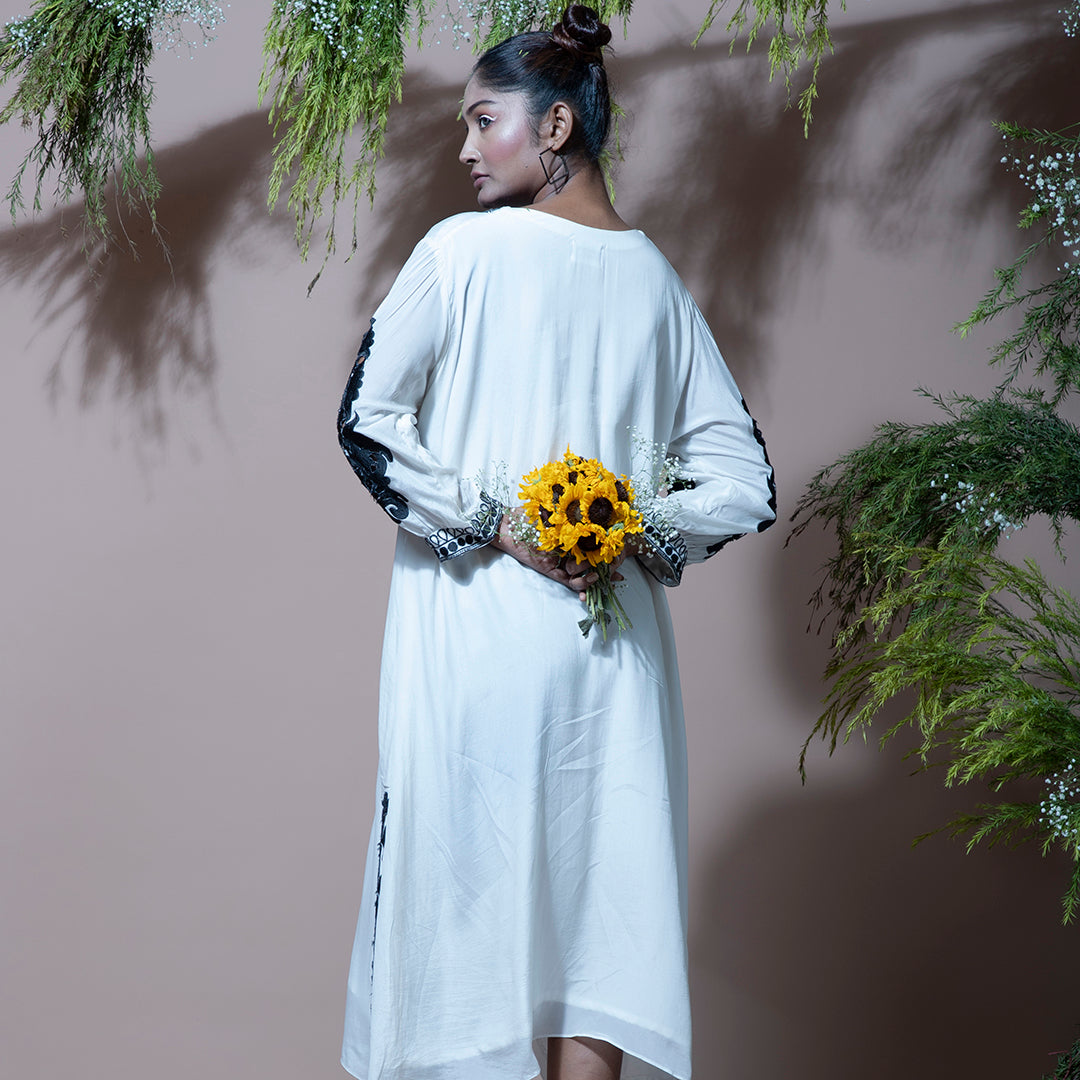 White dress with black cutwork
