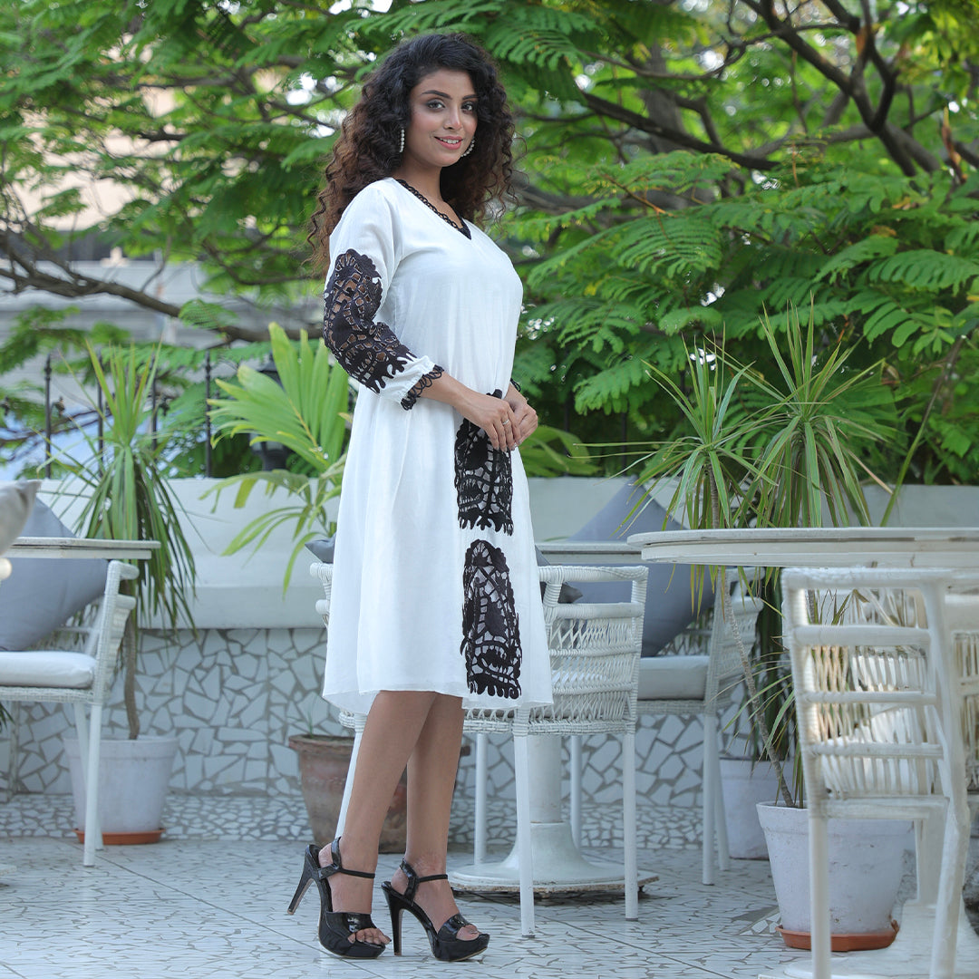 White dress with black cutwork
