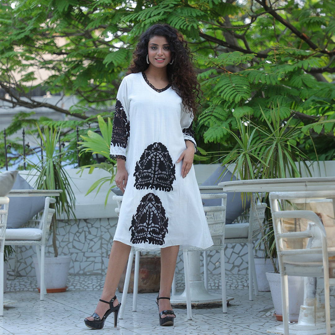 White dress with black cutwork