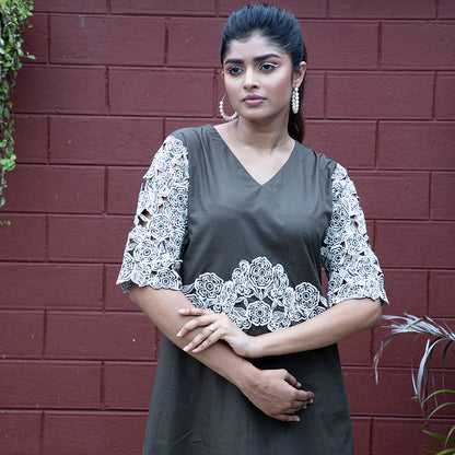 Cutwork dress with stylish belt