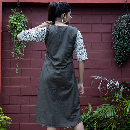Cutwork dress with stylish belt