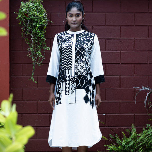 White and black applique dress