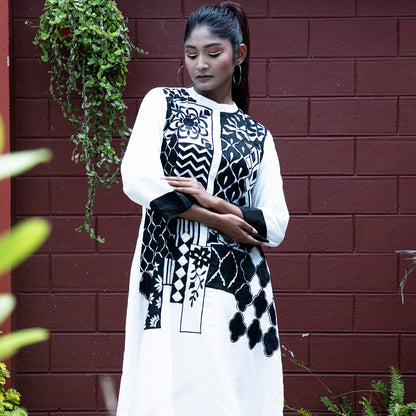 White and black applique dress