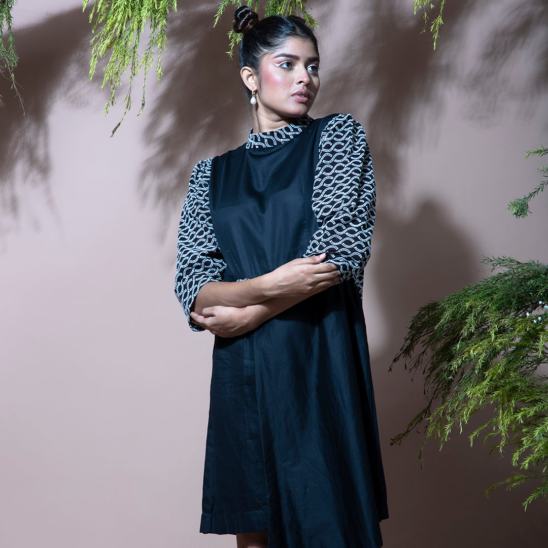 Black dress with cutwork embroidery sleeves