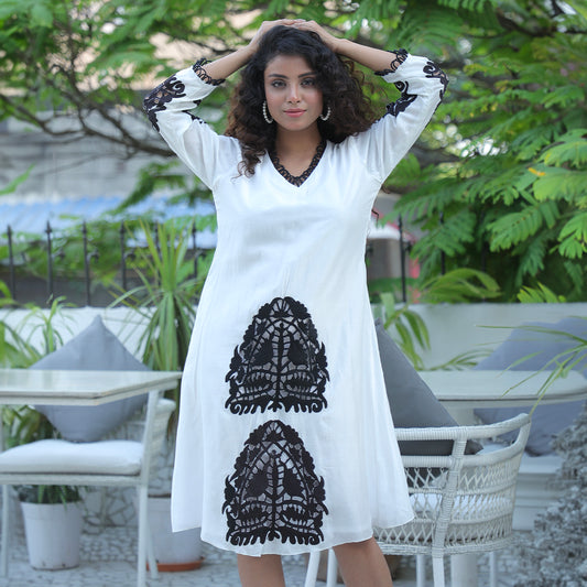 White dress with black cutwork