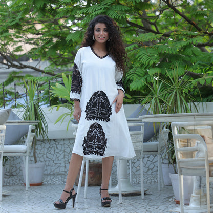 White dress with black cutwork